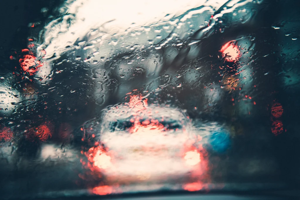 hydroplaning on rainy roads, car in rain